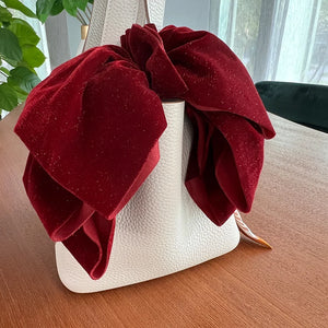 Velvet oversize bow hair clip for women and girls, by Hot Trend Vault, featuring a stylish and elegant accessory for hair.