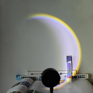 USB Sunset Lamp by Hot Trend Vault projecting LED rainbow neon light onto a bedroom wall.