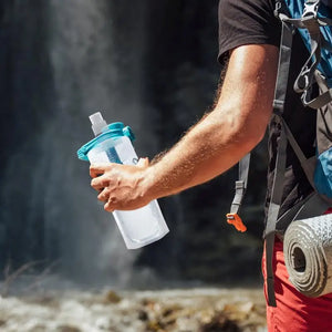 Foldable water bottle with built-in filter from Hot Trend Vault, ideal for outdoor and travel hydration on the go.