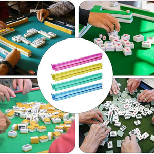 Multicolor acrylic Mahjong tile pushers set of 4, used for family board game storage and organization.