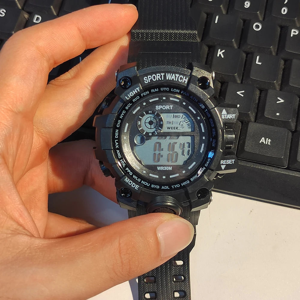Men's LED digital watch by Hot Trend Vault featuring luminous display, waterproof design, and sporty military style.