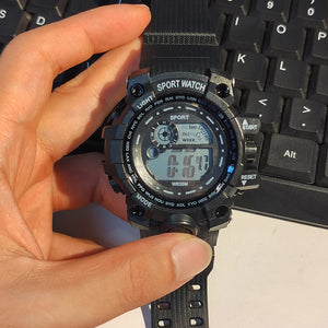Men's LED digital watch by Hot Trend Vault featuring luminous display, waterproof design, and sporty military style.