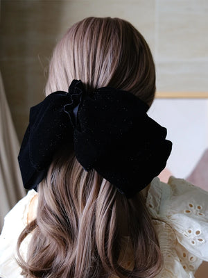 Velvet oversize bow hair clip for women and girls by Hot Trend Vault, featuring a stylish, large bow design.