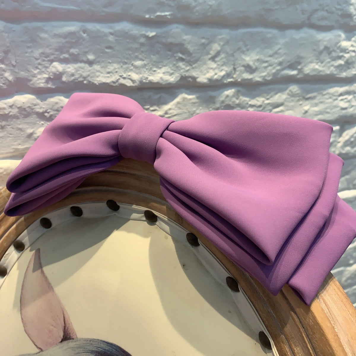 Multi-layer hair clip with pink and black bows by Hot Trend Vault, stylish Korean fashion accessory for women and girls.