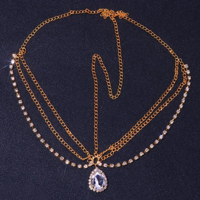 Sparkling crystal forehead chain for women by Hot Trend Vault, featuring a luxurious stone fan design for bridal headwear.