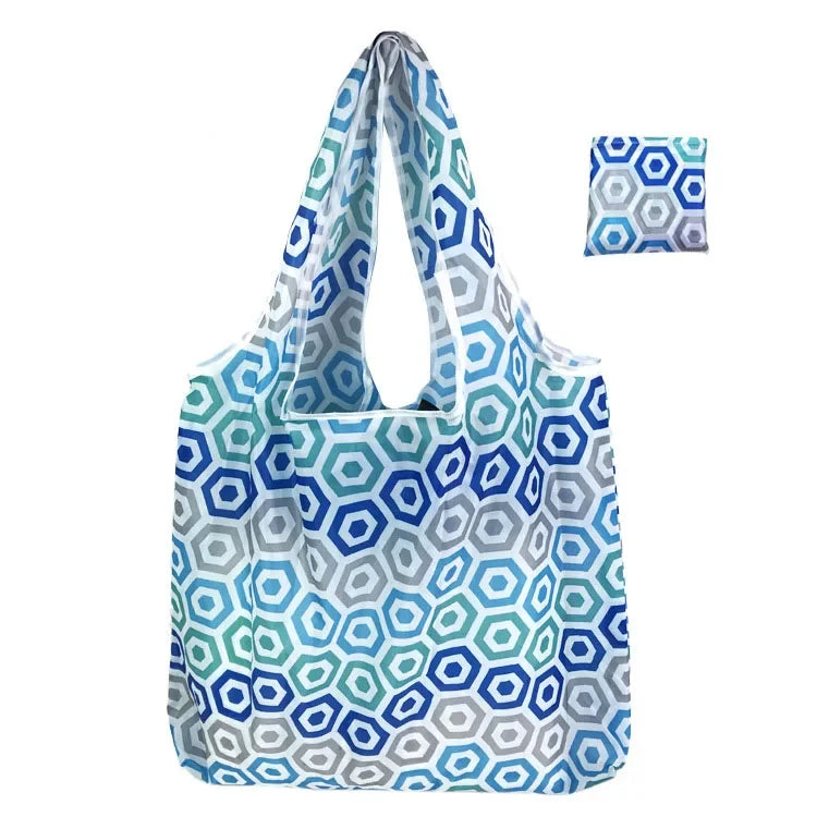 Reusable shopping bag for women by Hot Trend Vault, large eco foldable tote with carrying case, shown folded and open for shopping.