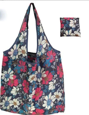 Large eco-friendly foldable tote bag for women by Hot Trend Vault, shown with case for reusable shopping and storage.