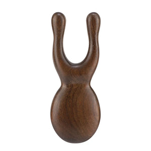 Hot Trend Vault wooden Gua Sha facial tool made of sandalwood, used for face and neck massage to promote blood circulation.