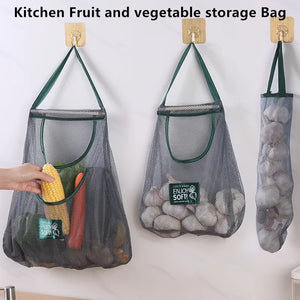 Reusable mesh storage bag by Hot Trend Vault, hanging net for onions, garlic, and potatoes in kitchen organization.