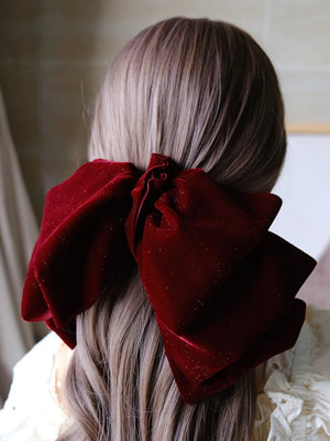 Velvet oversize bow hair clip for women and girls by Hot Trend Vault, featuring a stylish large bow design.