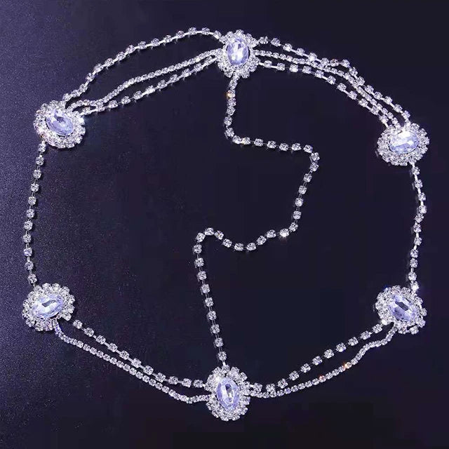 Crystal bridal forehead chain with stone fans and bling accents, luxurious headpiece for women by Hot Trend Vault.
