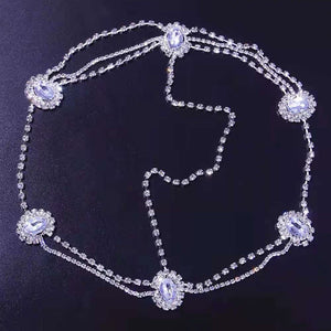Crystal bridal forehead chain with stone fans and bling accents, luxurious headpiece for women by Hot Trend Vault.