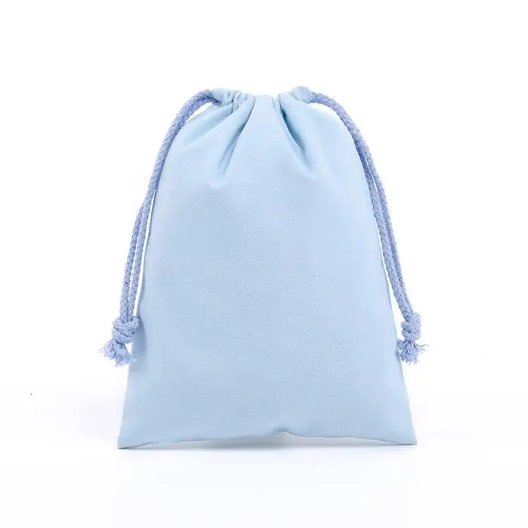 Set of Hot Trend Vault eco-friendly reusable cotton produce bags with drawstrings for storing fruits and vegetables.
