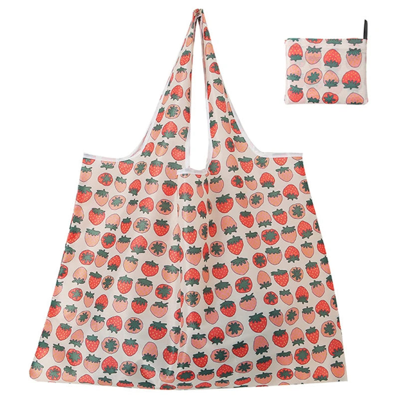 Reusable folding shopping bag by Hot Trend Vault with cartoon lemon and strawberry print, eco-friendly and portable tote for shoppers.