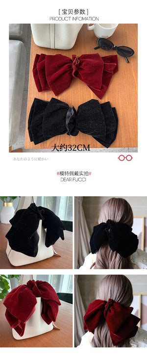 Velvet oversized bow hair clip for women and girls by Hot Trend Vault, featuring a stylish and soft velvet finish.