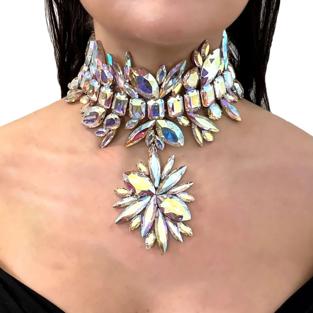 StoneFans rhinestone flower jewelry set for women featuring a glamorous necklace, earrings, and bracelet with sparkling stones.
