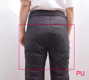 Lightweight winter hiking down pants for men and women by Hot Trend Vault, insulated and warm for outdoor cold weather activities.