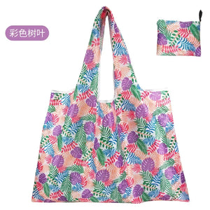 Reusable foldable shopping bag from Hot Trend Vault, large eco-friendly tote with sturdy handles, washable and ideal for women.