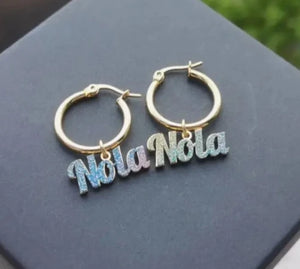 Colorful stainless steel gold nameplate bangles with custom kid's name necklace set from Hot Trend Vault, featuring vibrant, shiny jewelry.