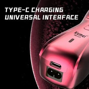Kemei KM-8502 cordless hair clipper kit for home grooming, featuring multiple attachments and a rechargeable battery.