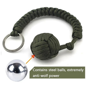 Outdoor self-defense umbrella rope kit with steel ball and monkey fist, paracord key chain, designed for outdoor enthusiasts by Hot Trend Vault.