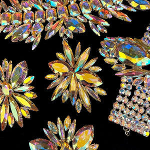 StoneFans rhinestone flower jewelry set for women featuring necklace, earrings, and bracelet with glamorous drag queen style.