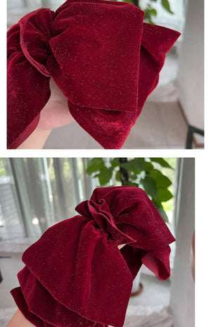 Velvet oversize bow hair clip for women and girls by Hot Trend Vault, featuring a stylish, soft fabric design.