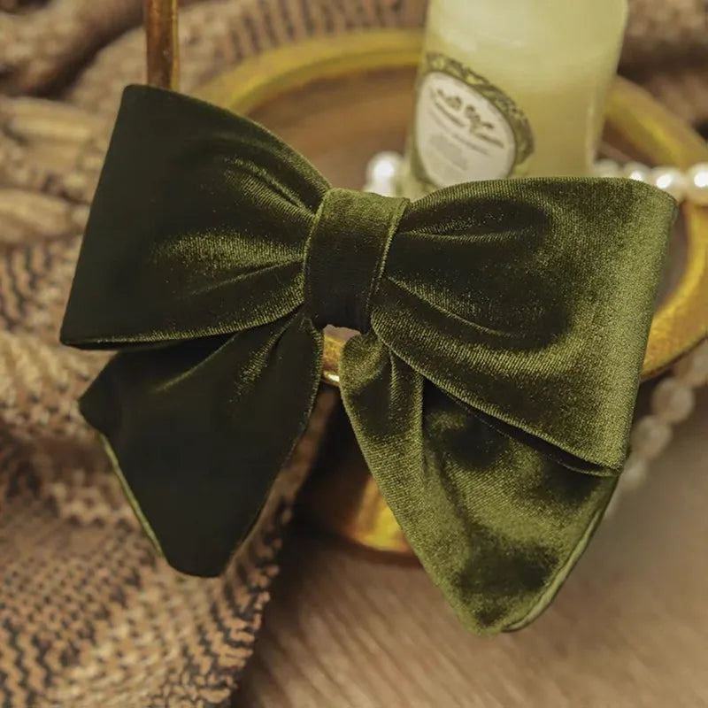 Velvet hair clips with three-dimensional bowknot design for women and girls, elegant accessory by Hot Trend Vault.