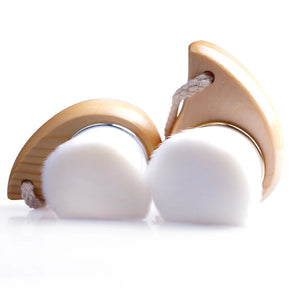 Hot Trend Vault facial cleansing brush with wooden handle and soft bristles for gentle daily skin cleaning.