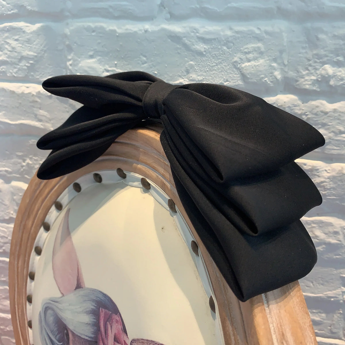 Multi-layer hair clips in solid pink and black from Hot Trend Vault, stylish hair accessories for women and girls.