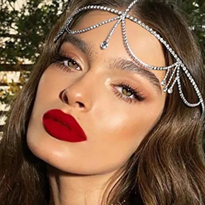 Crystal bridal forehead chain with stone fans and bling design, elegant headpiece for women from Hot Trend Vault.