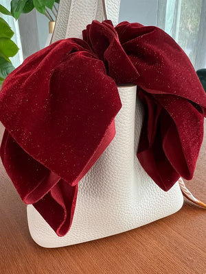 Velvet oversize bow hair clip for women and girls, stylish accessory from Hot Trend Vault, featuring a soft, plush fabric design.