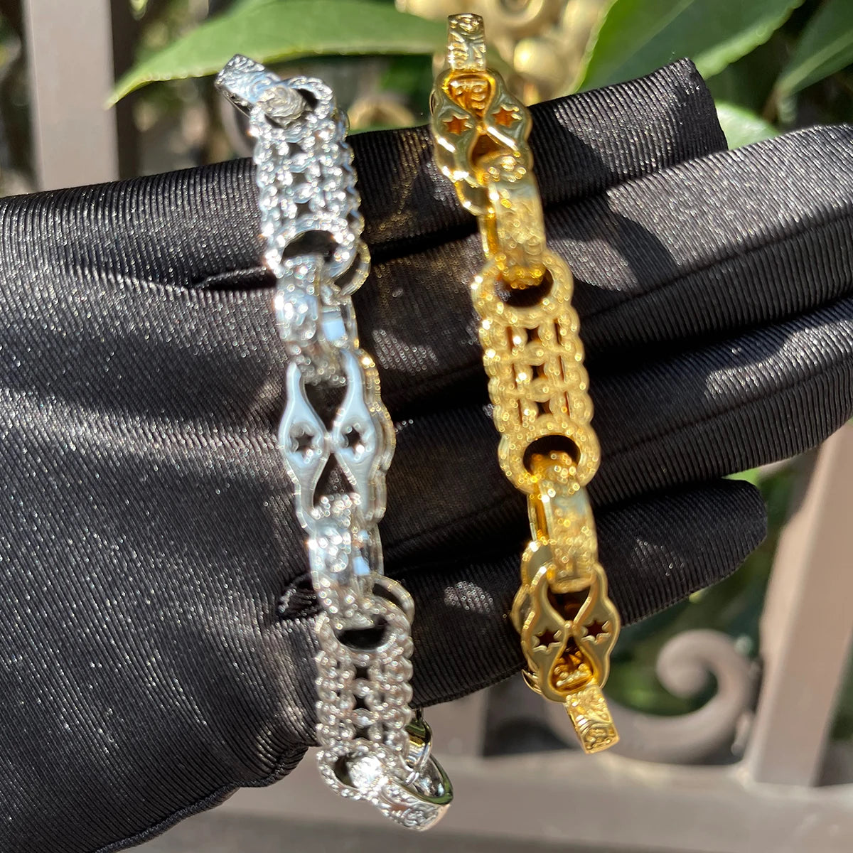 Gold plated bubble letter bracelet for men with iced out jewelry design, featuring bold, shiny lettering and stylish chain links.