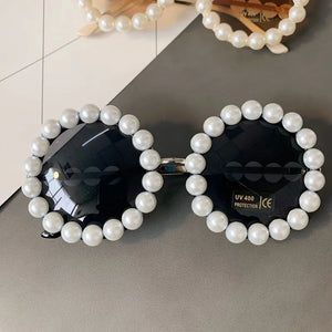 Pearl round sunglasses for women and men with small oval vintage frame by VICKICOCO, featuring luxury designer style.