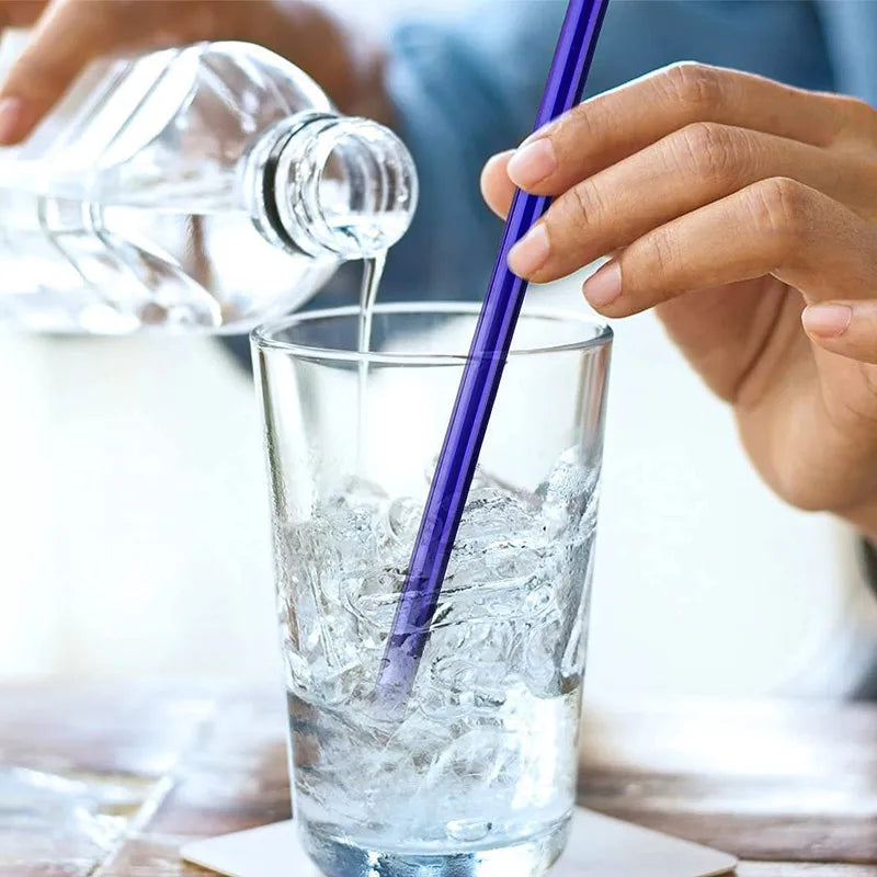 Set of reusable glass straws with cleaning brush from Hot Trend Vault, eco-friendly and transparent for sustainable drinking.