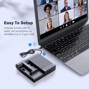 Hot Trend Vault DOSS wireless Bluetooth speaker with 15W charger, adjustable phone stand, and 8-hour playtime on a desk.