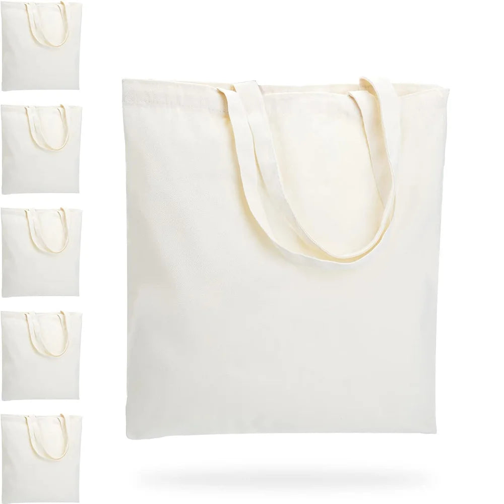 Six reusable canvas tote bags by Hot Trend Vault, eco-friendly and durable grocery bags for eco-conscious shoppers.