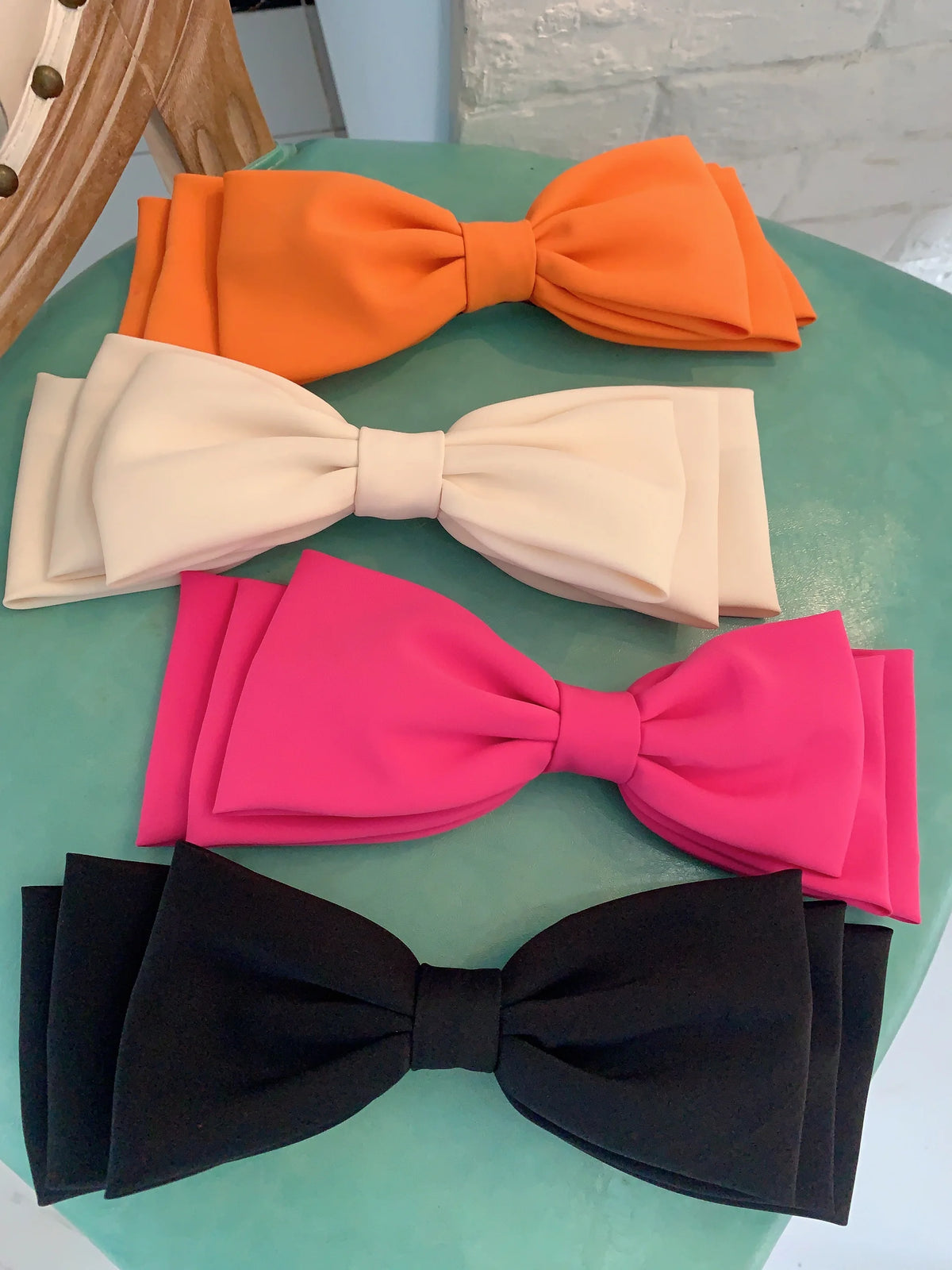 Multi-layer hair clip with pink and black bows by Hot Trend Vault, styled for women and girls in chic Korean fashion accessory.