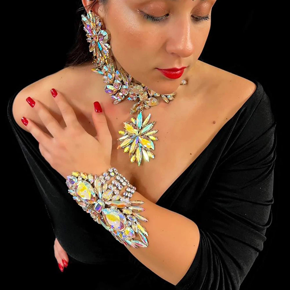 StoneFans rhinestone flower jewelry set for women, includes necklace, earrings, and bracelet with glamorous floral design.