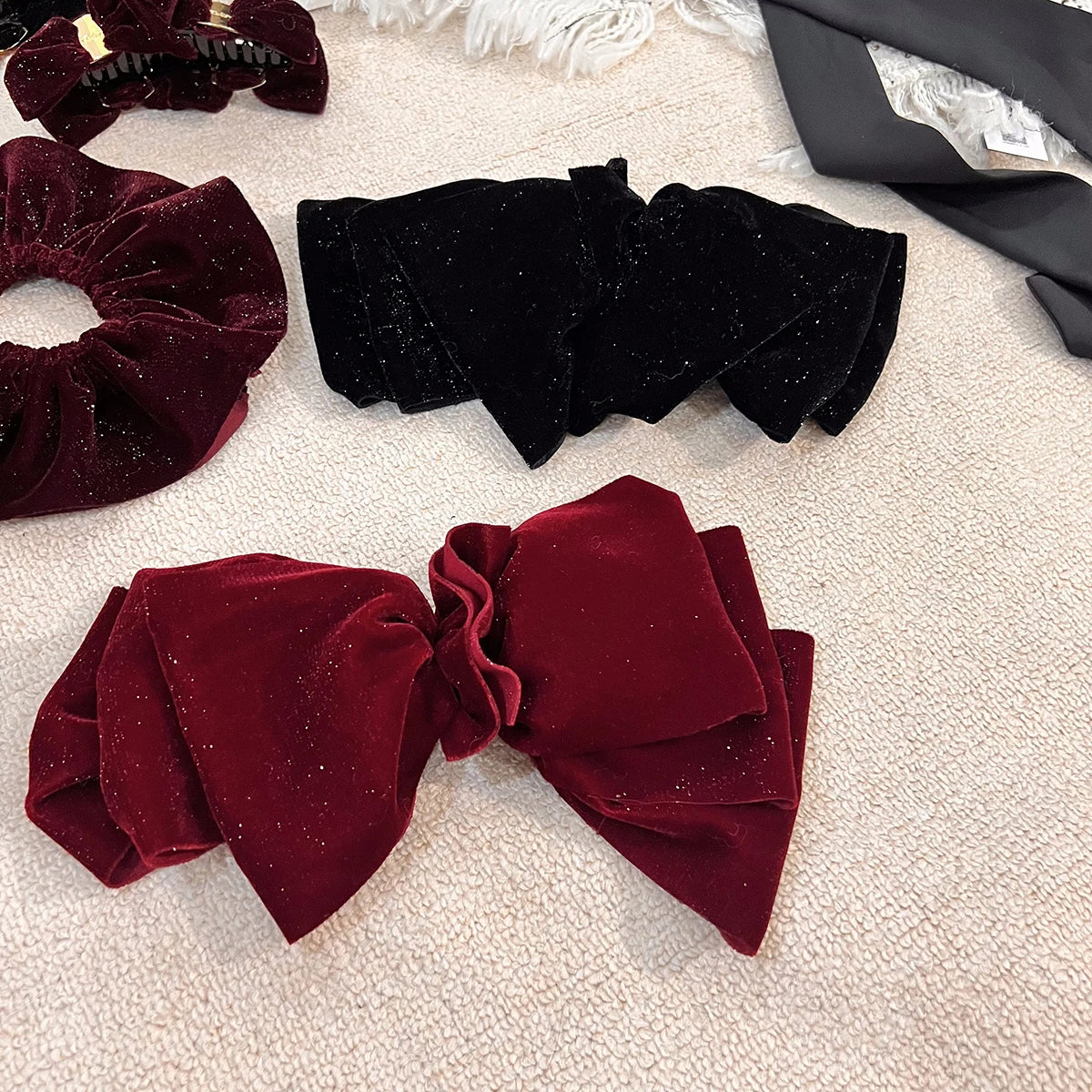 Velvet oversized bow hair clip for women and girls, stylish accessory by Hot Trend Vault, featuring a soft, elegant design.