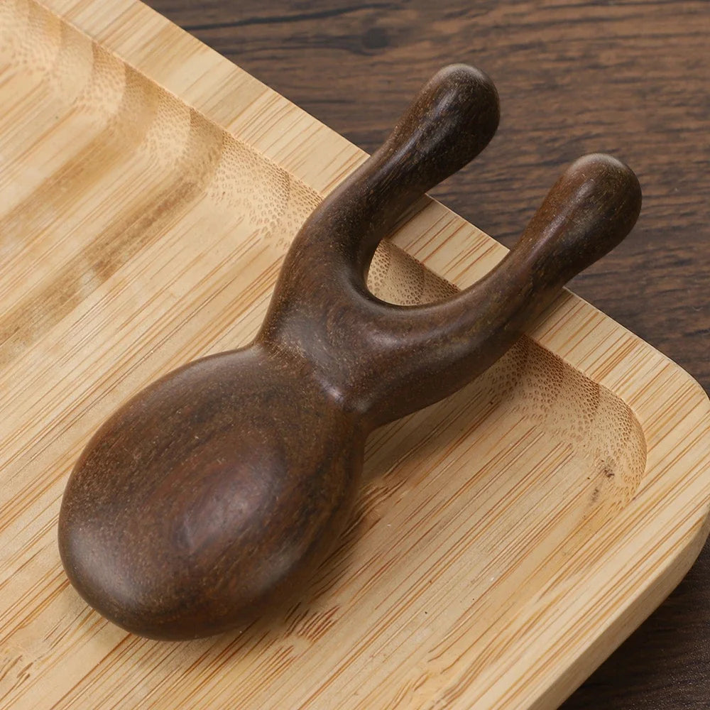 Hot Trend Vault Wooden Gua Sha facial tool made of sandalwood for face and neck, promotes blood circulation for home spa use.