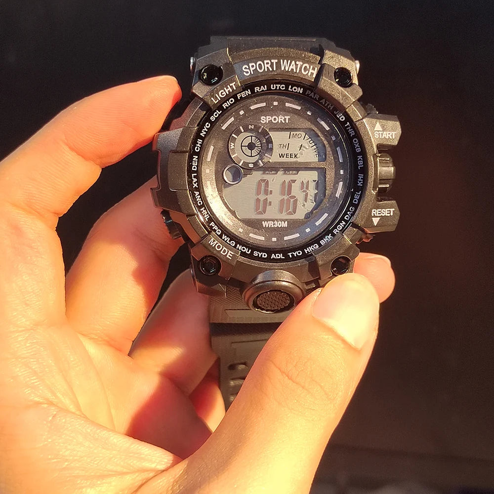 Men's LED digital watch by Hot Trend Vault featuring luminous display, waterproof design, and military-style for sports and everyday wear.