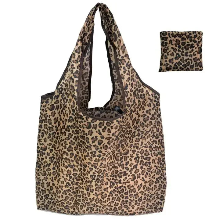Large eco-friendly foldable reusable shopping bag for women by Hot Trend Vault, shown with case and spacious interior.
