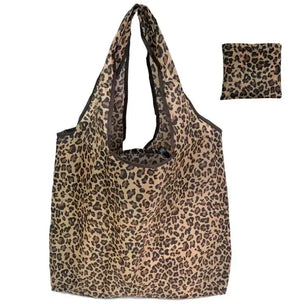 Large eco-friendly foldable reusable shopping bag for women by Hot Trend Vault, shown with case and spacious interior.