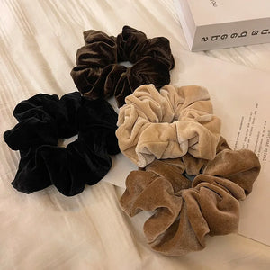 Large velvet hair scrunchie from Hot Trend Vault with luxurious cashmere feel, ideal for women and girls' hairstyles.