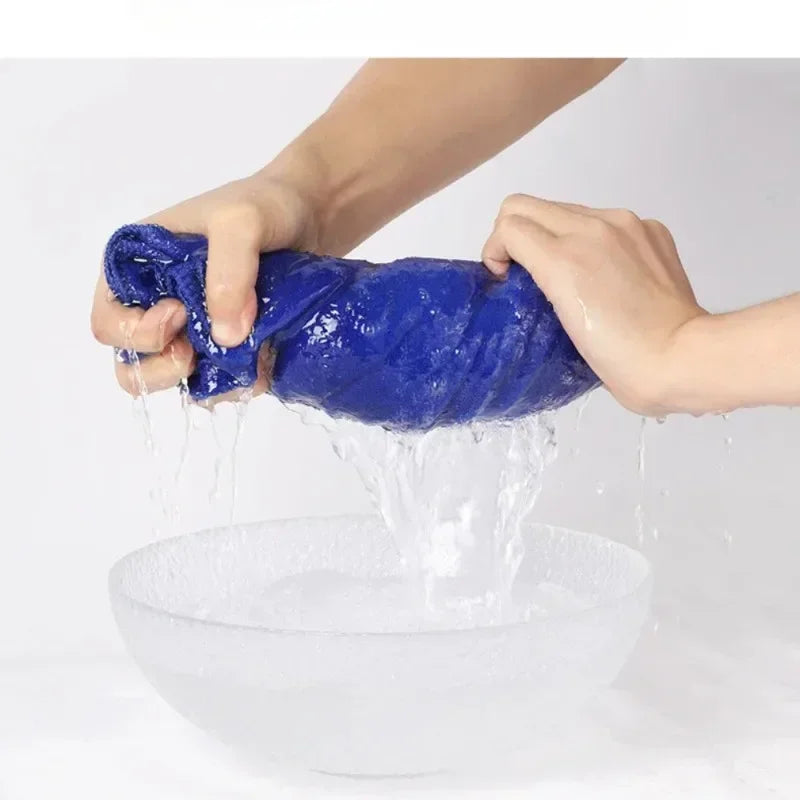 Hot Trend Vault microfiber cleaning cloths, lint-free and streak-free for home cleaning, shown folded on a white surface.