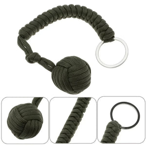 Outdoor self-defense umbrella rope kit with monkey fist steel ball and paracord key chain by Hot Trend Vault, designed for outdoor enthusiasts.