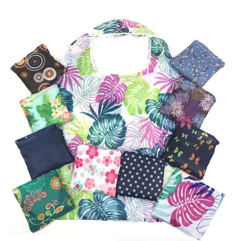 Large foldable eco-friendly shopping tote bag for women by Hot Trend Vault, shown with carrying case.