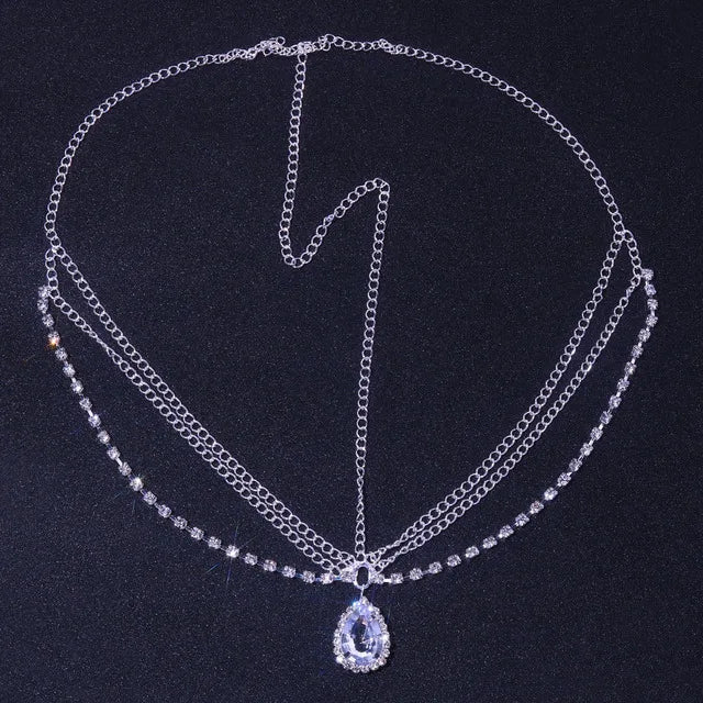 Crystal bridal forehead chain with stone fans and bling design, luxurious headpiece for women by Hot Trend Vault.