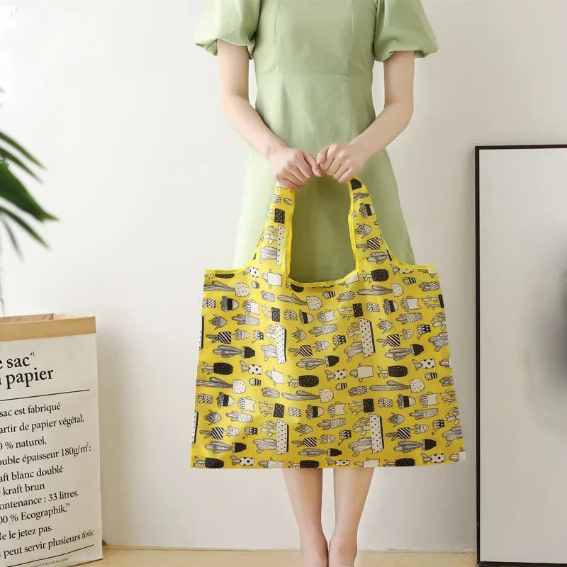 Large, eco-friendly reusable foldable shopping bag by Hot Trend Vault, featuring a durable design and spacious tote for women.